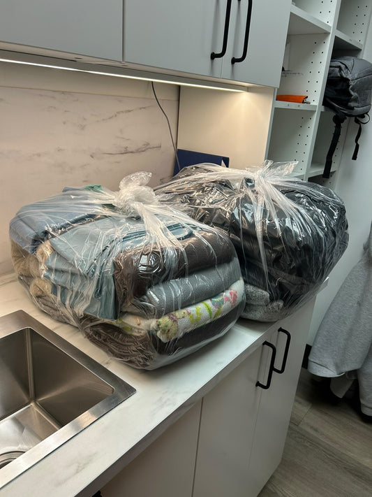 LABADA commercial laundry delivery of clean towels and linens to a Coquitlam clinic