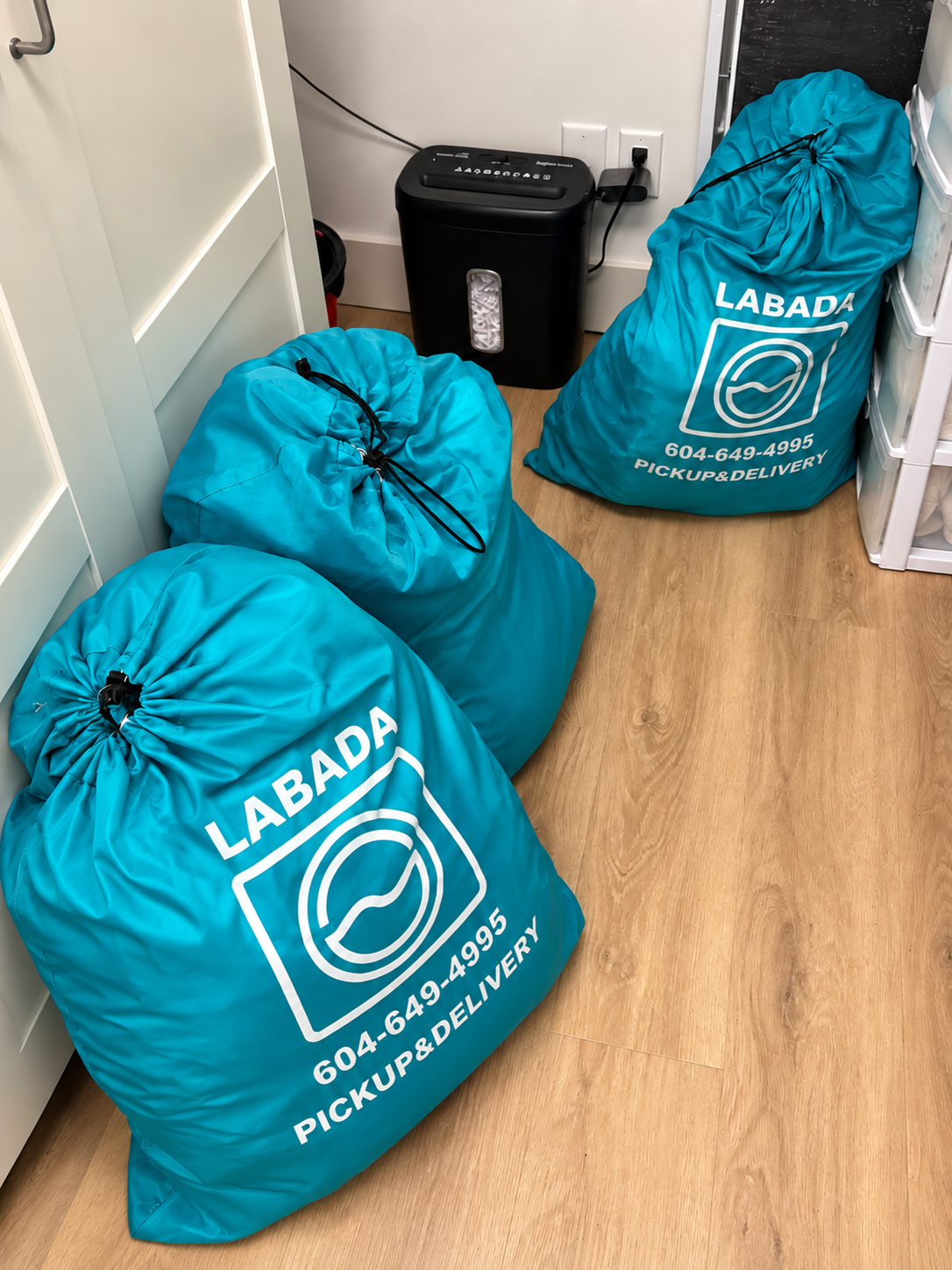 LABADA reusable laundry bags prepared for pickup and delivery across the Lower Mainland, British Columbia