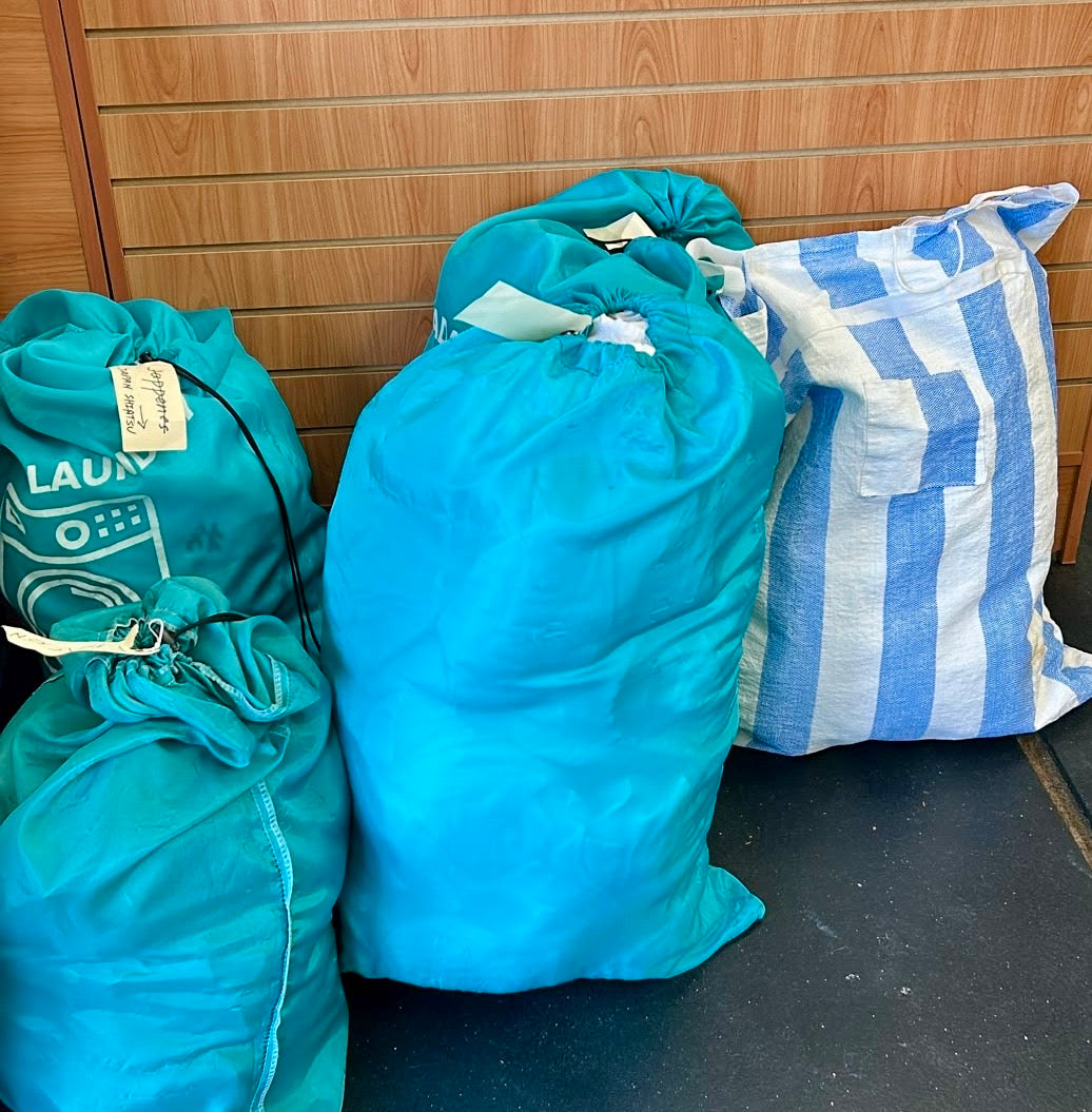 Commercial laundry pickup for a North Shore massage and wellness business