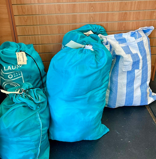 Commercial laundry pickup for a North Shore massage and wellness business